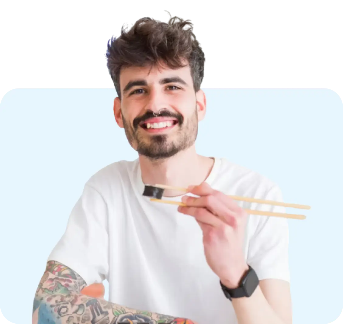 a man eating sushi